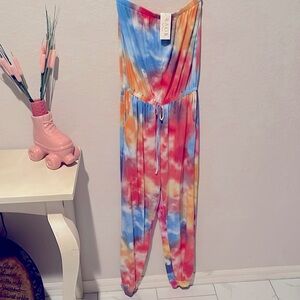 New with tags colorful strapless romper. Stretchy. Smoke free home